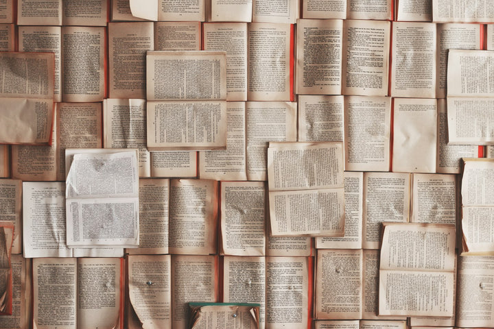 An open notebook on a wooden surface